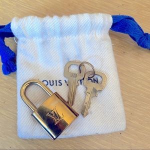 Genuine Louis Vuitton lock and keys with dust bag